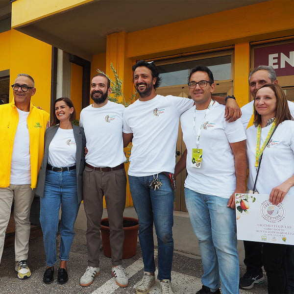 Group photo of eight volunteers