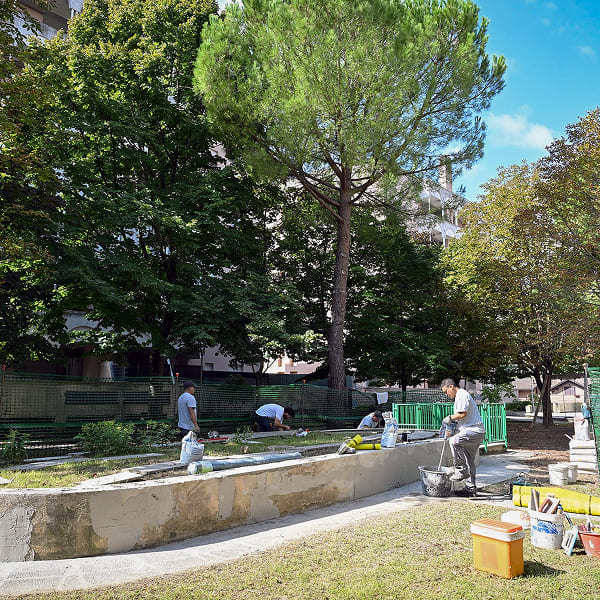 Volunteers working to redevelop a public flowerbed