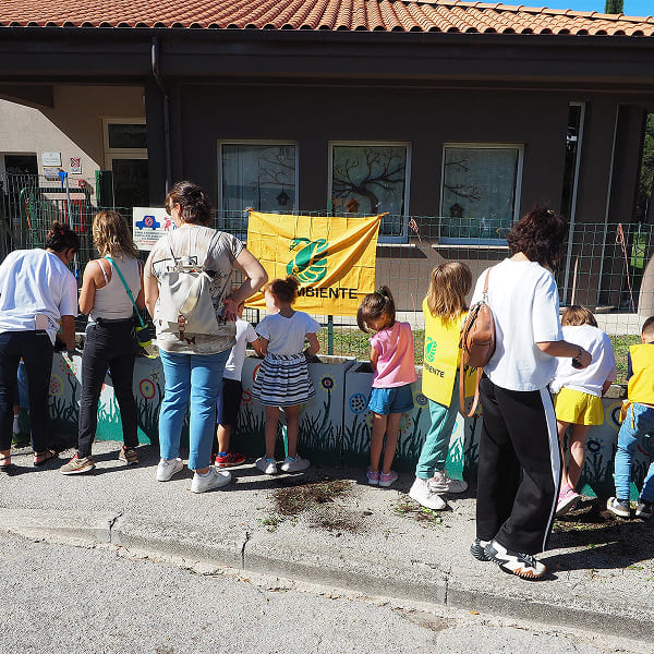 Adults and children at an event of the Week of Guardianship