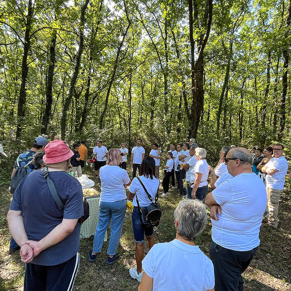 Group of people gathered in the woods