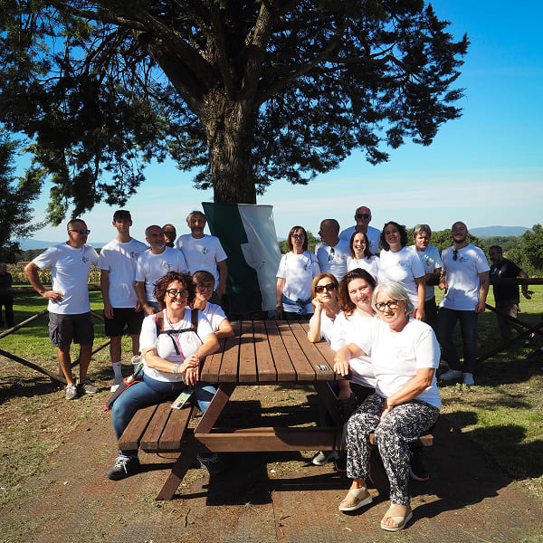 Group of volunteers under a tree