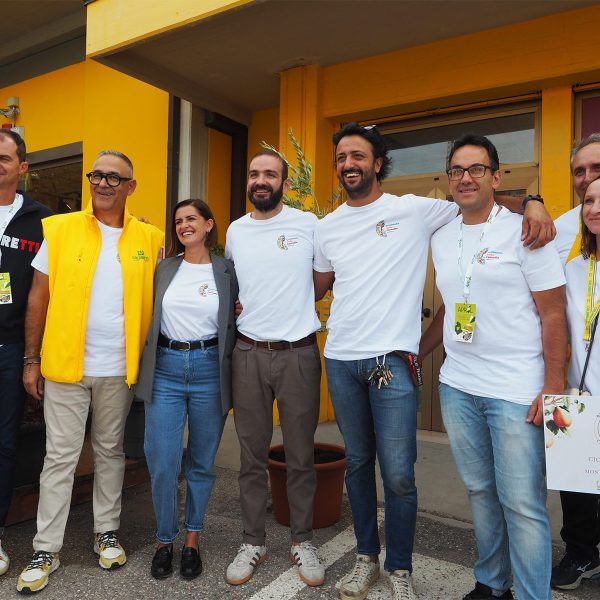 Group photo of eight volunteers