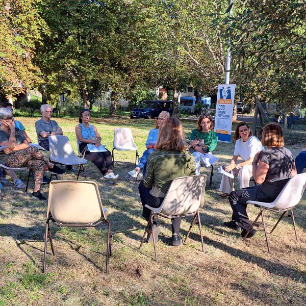 Volunteer group meeting in a public park
