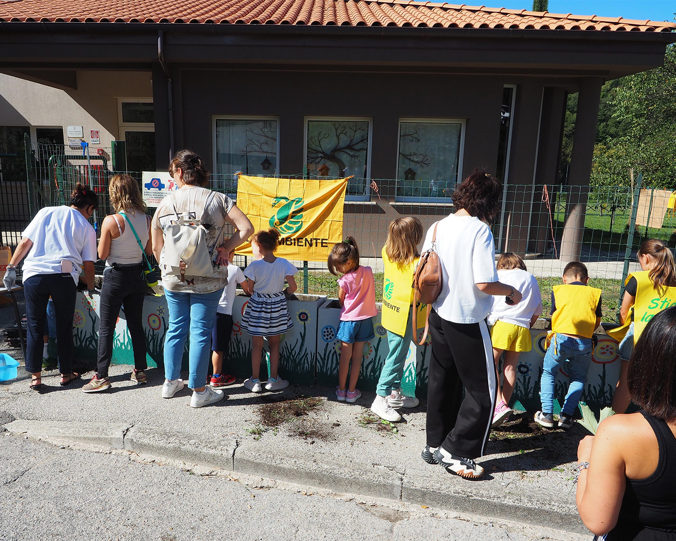 Adults and children at an event of the Week of Guardianship