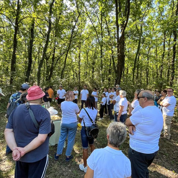 Group of people gathered in the woods