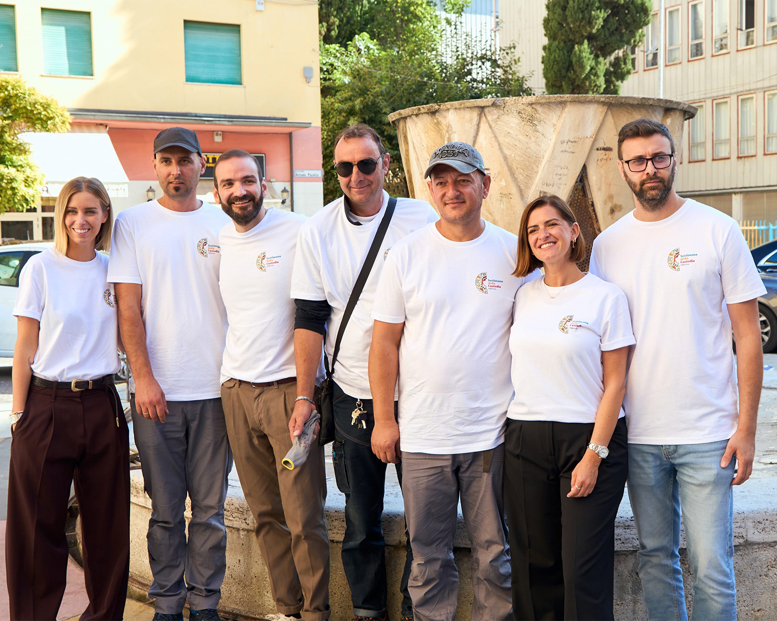 Seven volunteers in Week of Guardianship t-shirts