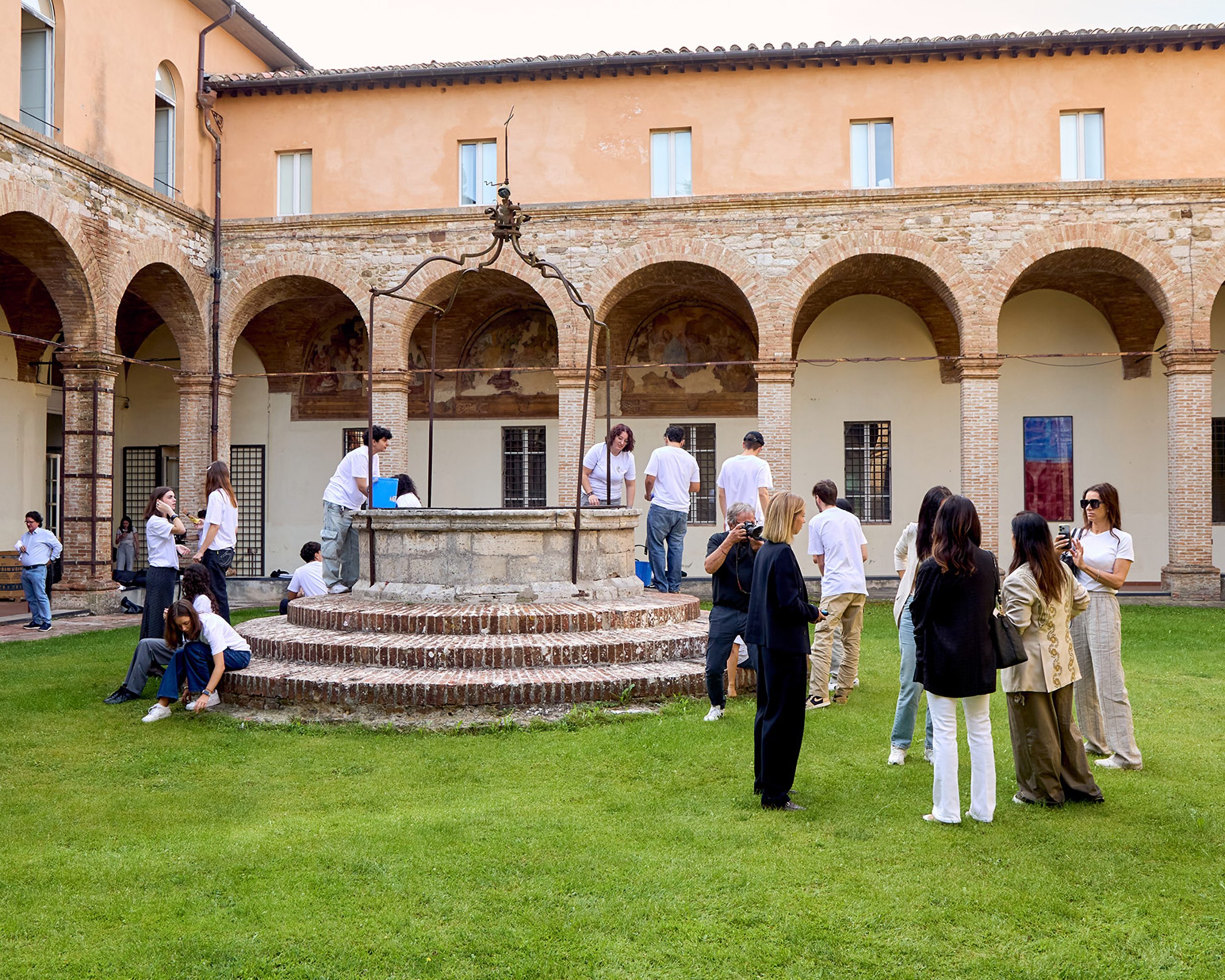 Volunteers gathered in historic courtyard